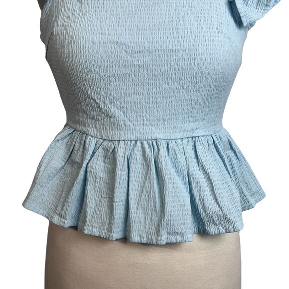 Anisa Peplum Jessie Bow Back Blouse in Light Blue by Francesca’s - Picture 4 of 16